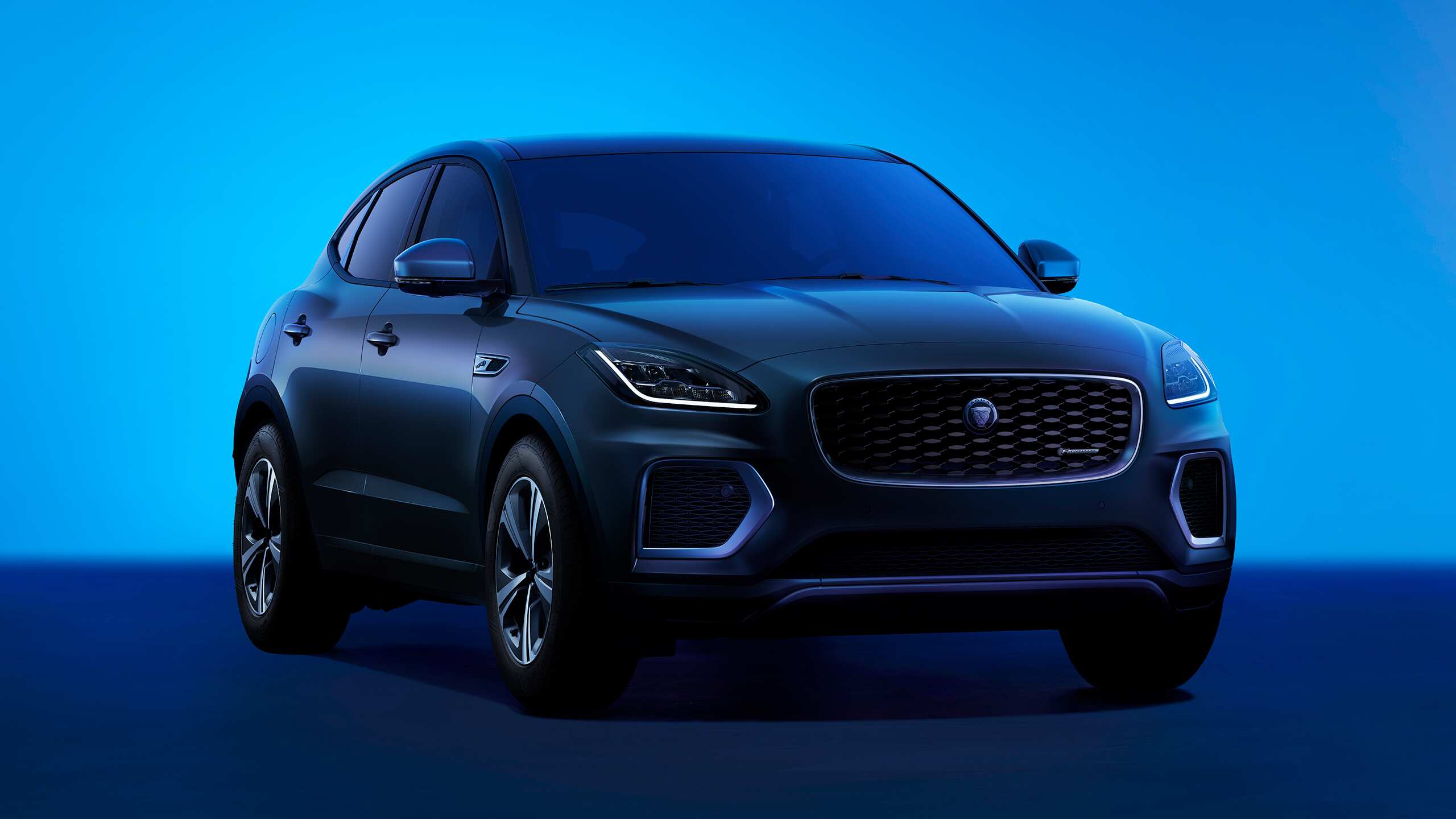 Jaguar E-Pace R-dyanamic in shades of blue background