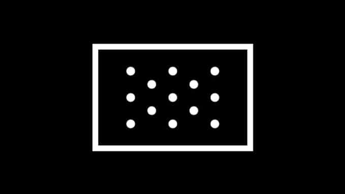 few white dots on black background