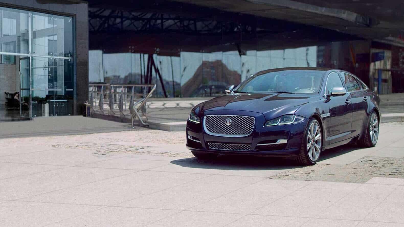 Jaguar XJ Outside Glass Office Building