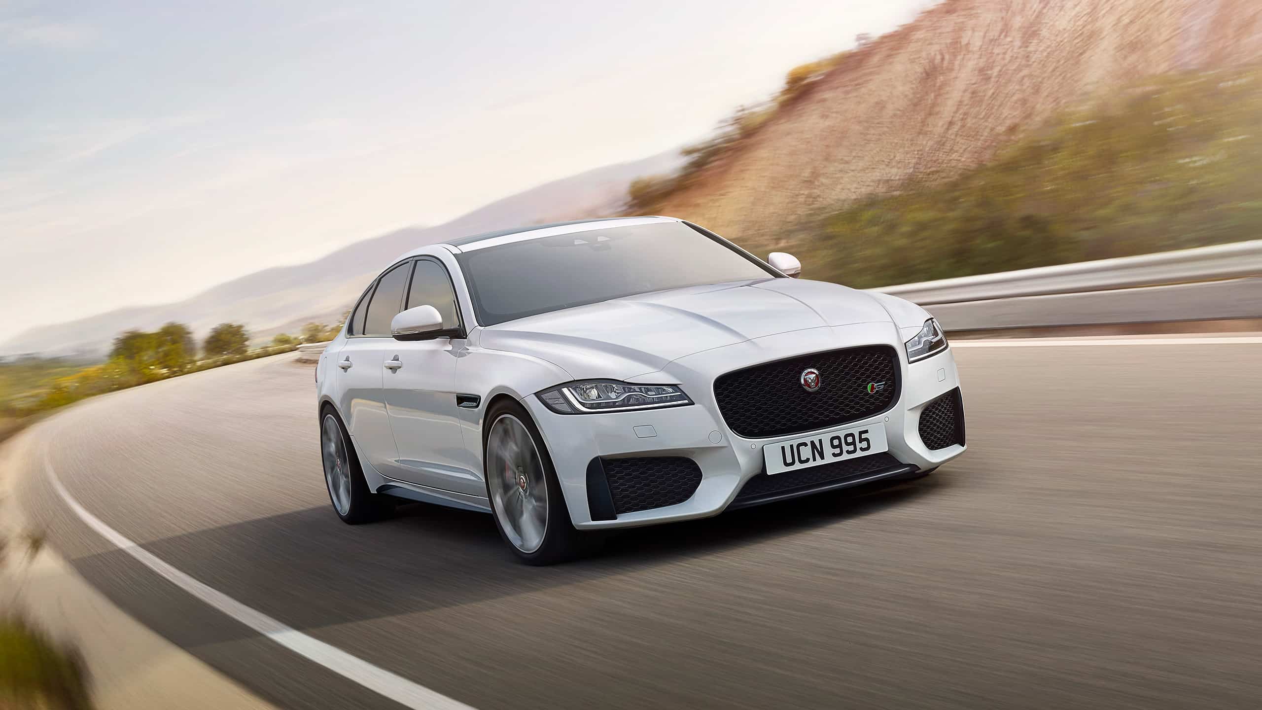 Jaguar XF Running on Highway