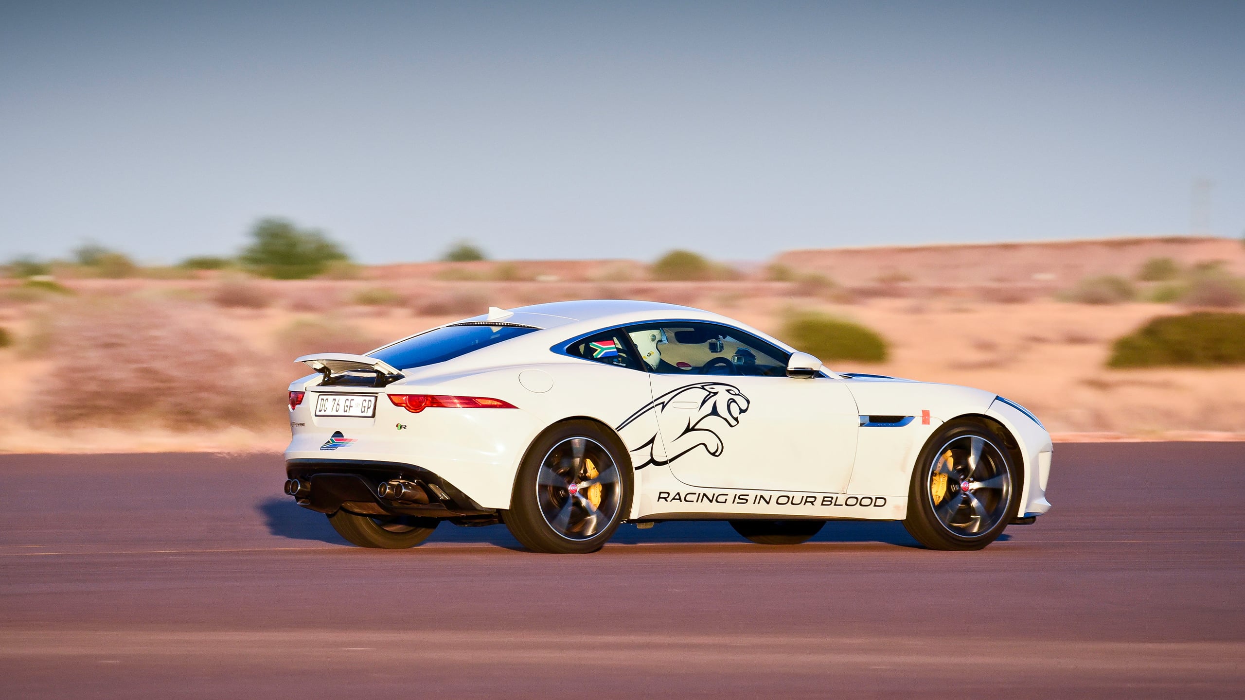 Jaguar F-TYPE running on racing track