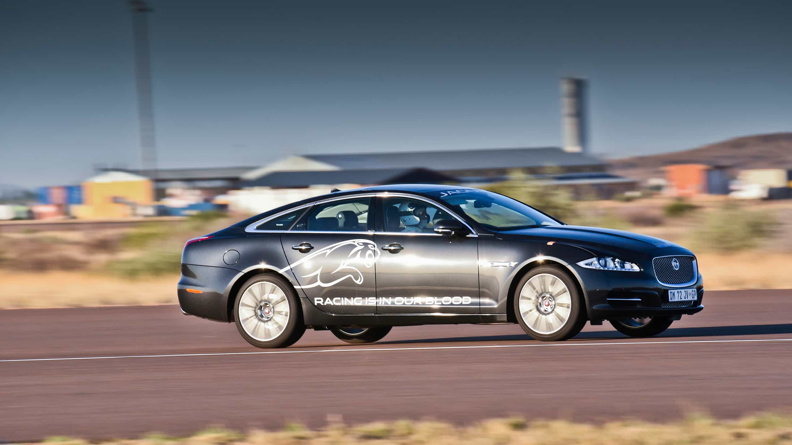 Jaguar XJ running on racing track