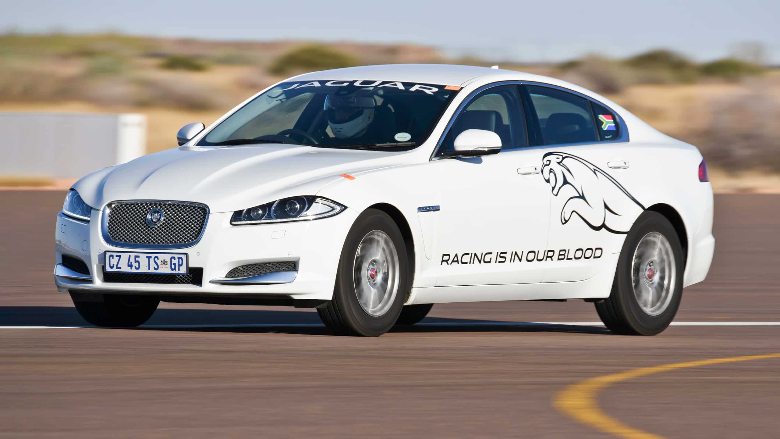 Jaguar XJ running on racing track