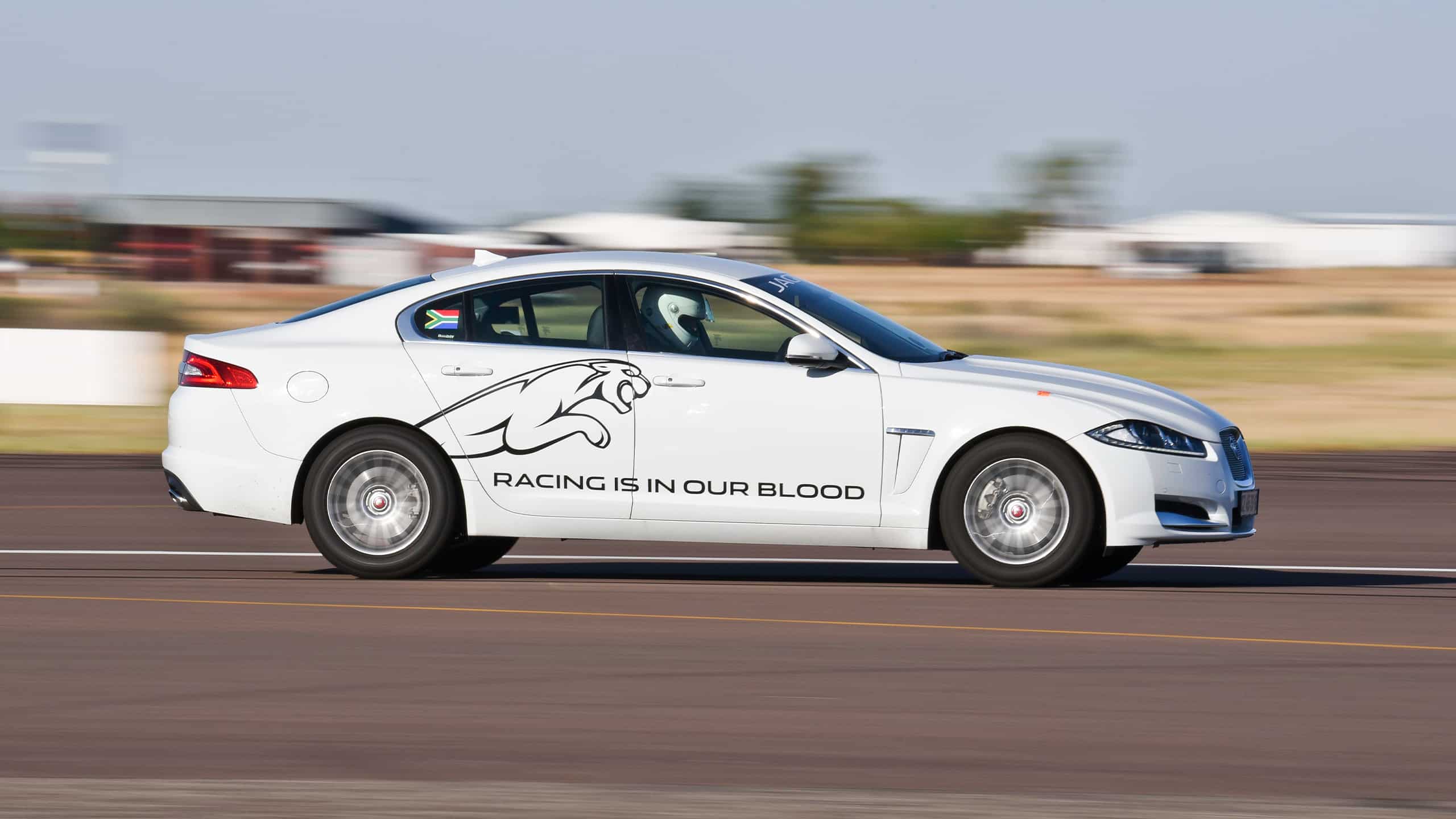 Jaguar XJ running on racing track