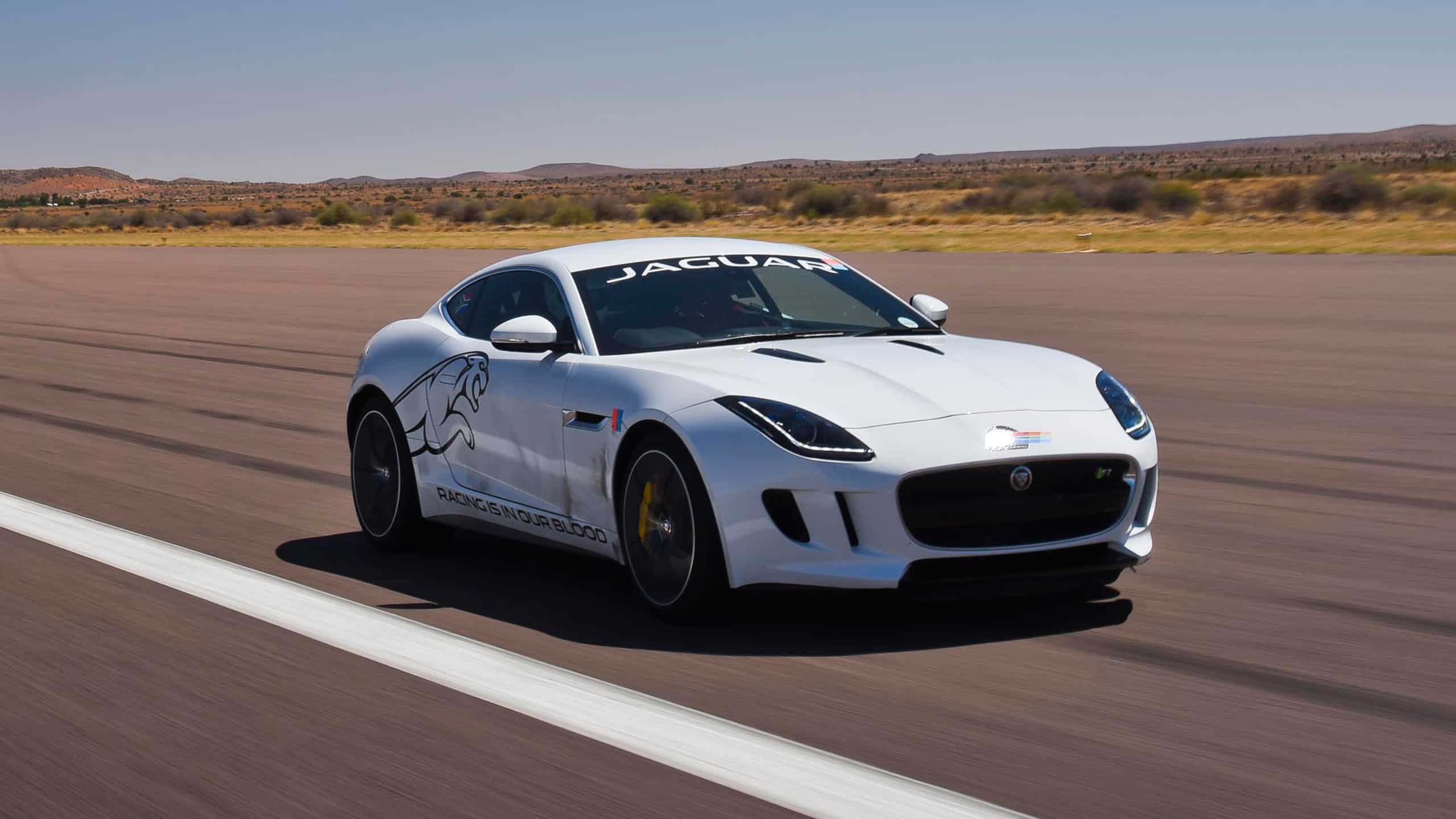 Jaguar F-TYPE running on racing track