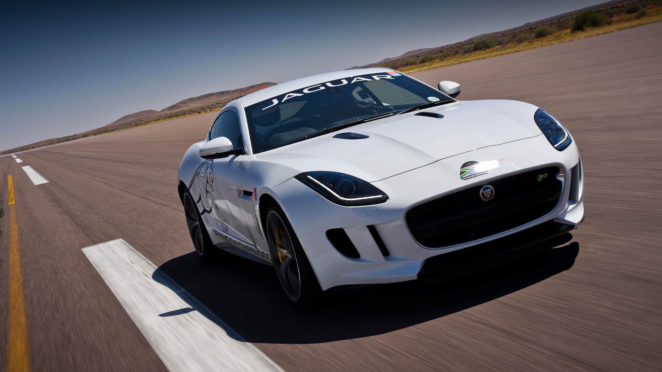Jaguar F- Type running on racing track