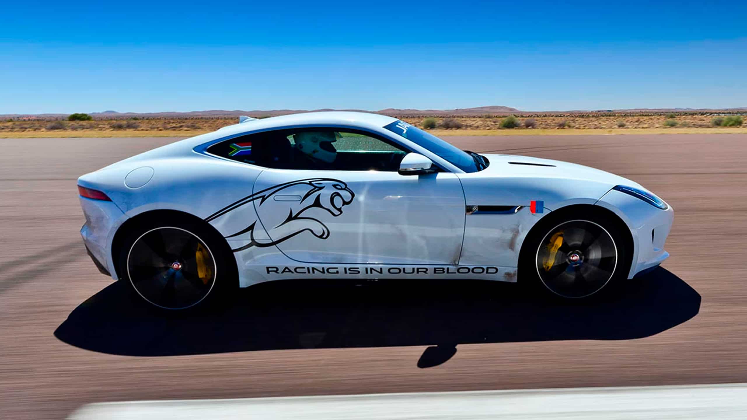 Jaguar F Type running on racing track